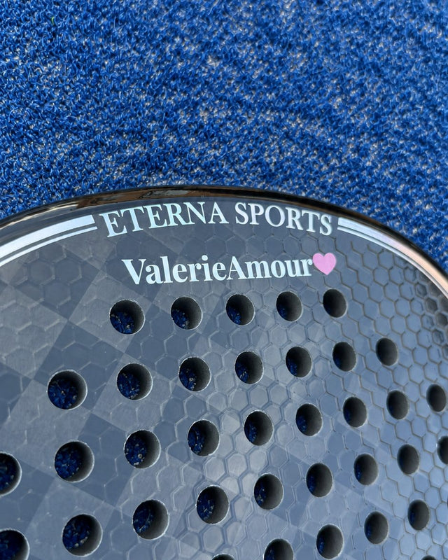 Tribeca Laser Black padel racket engraved with a name and a heart on the Crown, close-up