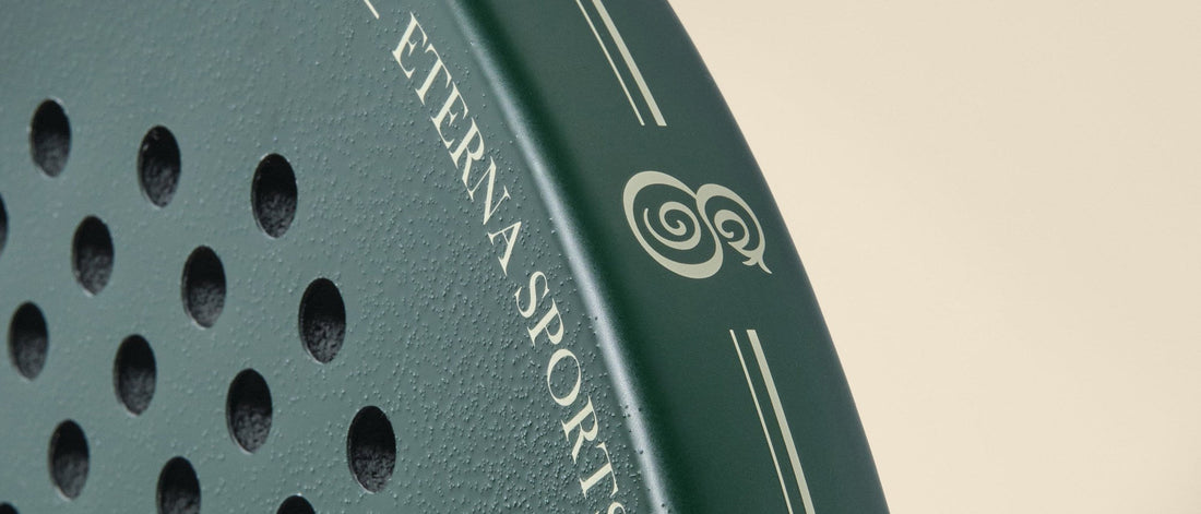 The face of the Eterna Bel Air Green padel racket in close-up, textured surface and wordmark at the crown