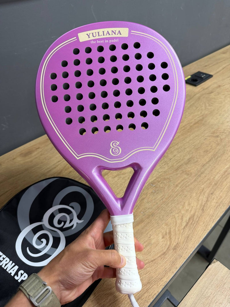A personalised Eterna racket with a name and message.
