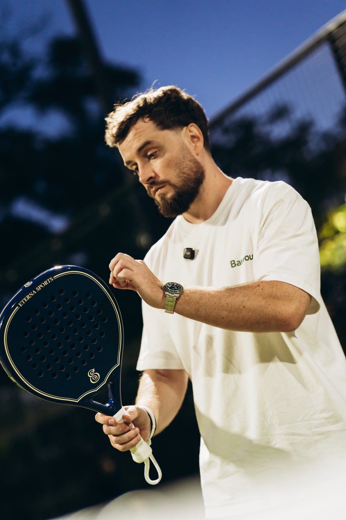 Eterna Soho Blue Glossy padel racket on court.
