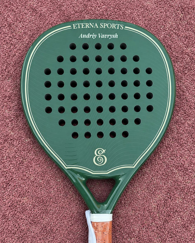 Bel Air Green Glossy padel racket engraved with the owner's name on the Crown, on a clay court
