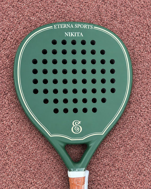 Bel Air Green Matte padel racket engraved with the owner's name on the Crown, on a clay court