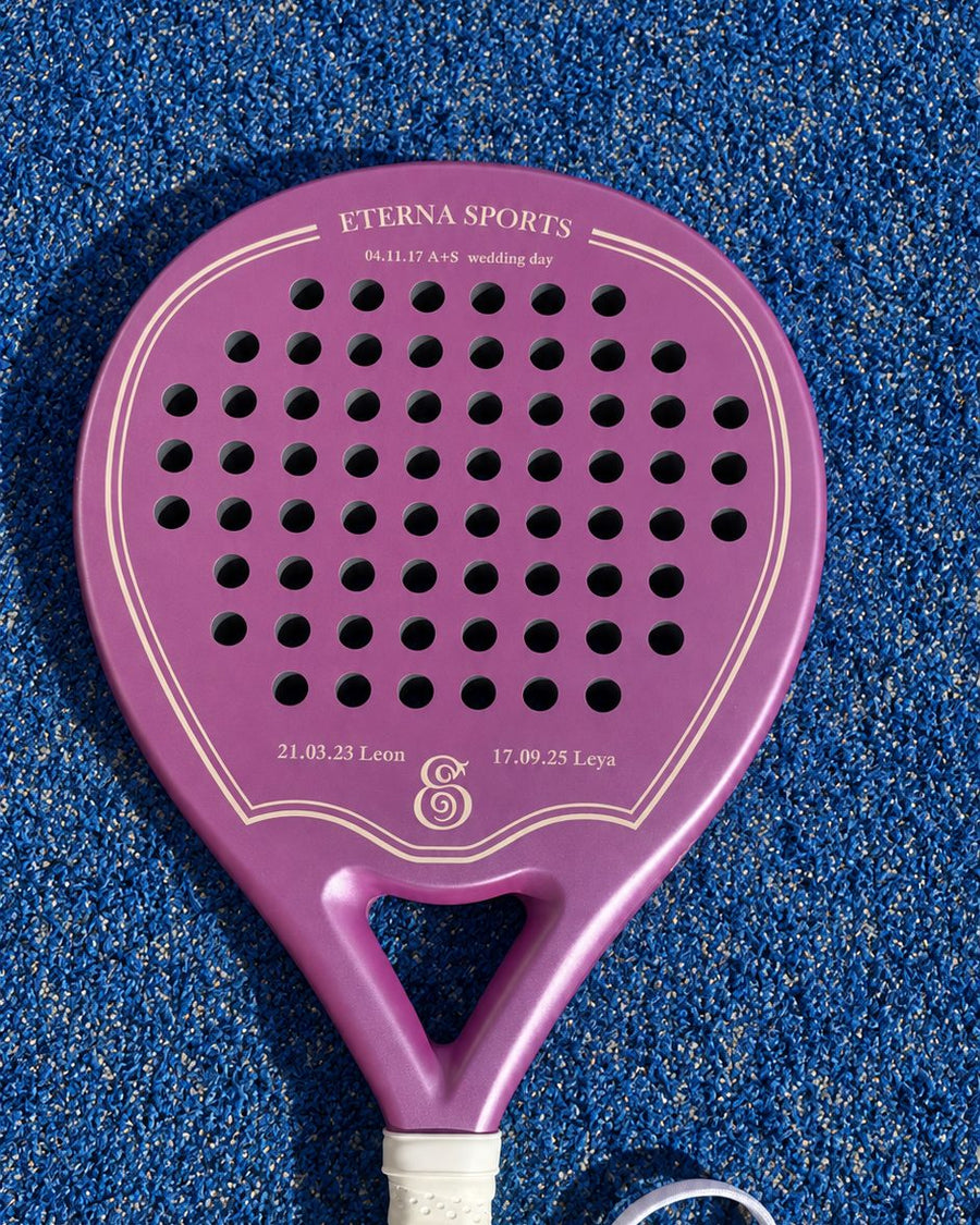 A date engraved on the right Wing of a Miami Rose padel racket
