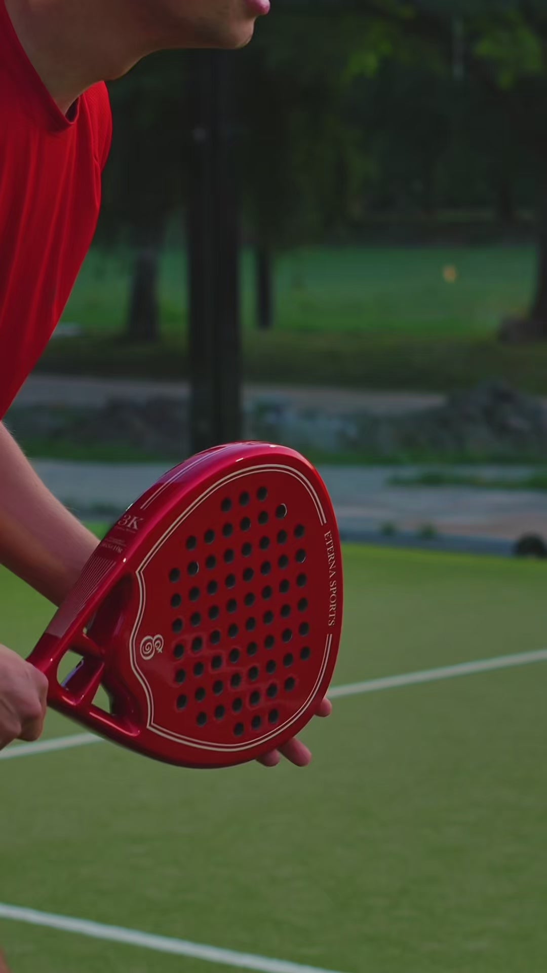 Eterna Sports Monaco Red Glossy padel racket — court play
