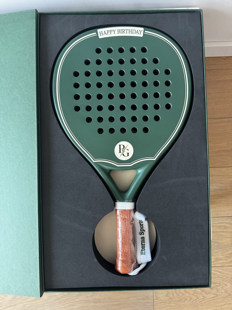 Eterna Sports racket engraved with Happy Birthday and personal initials, presented as a gift in its green box