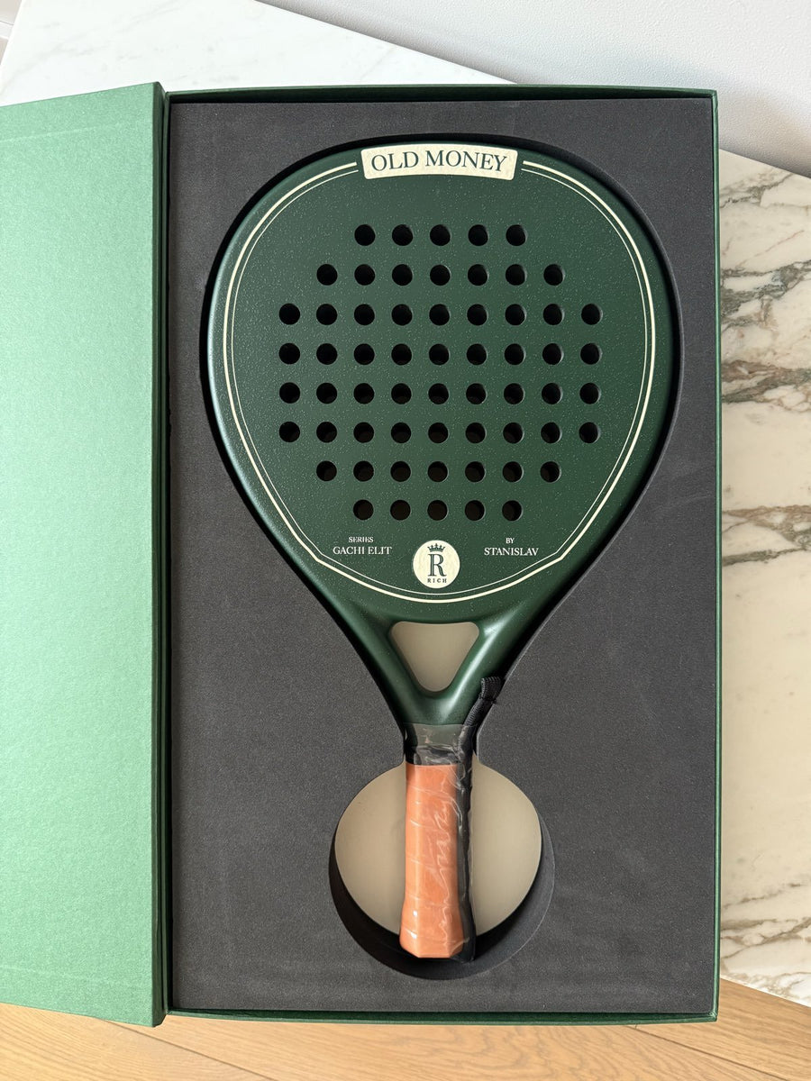 Fully customised Eterna Sports racket with bespoke branding, in a green presentation box